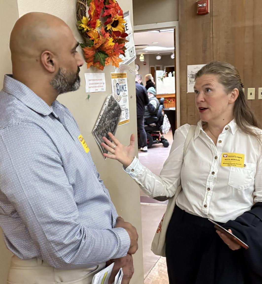 Chatting with a board member of the Council on Aging